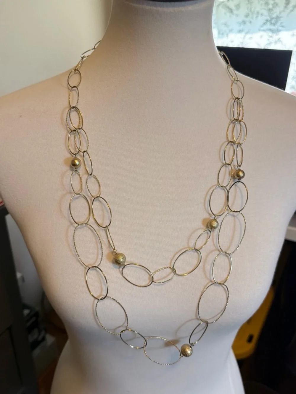 Long Gold Multi-Chain Oval Necklace with Bead Accents